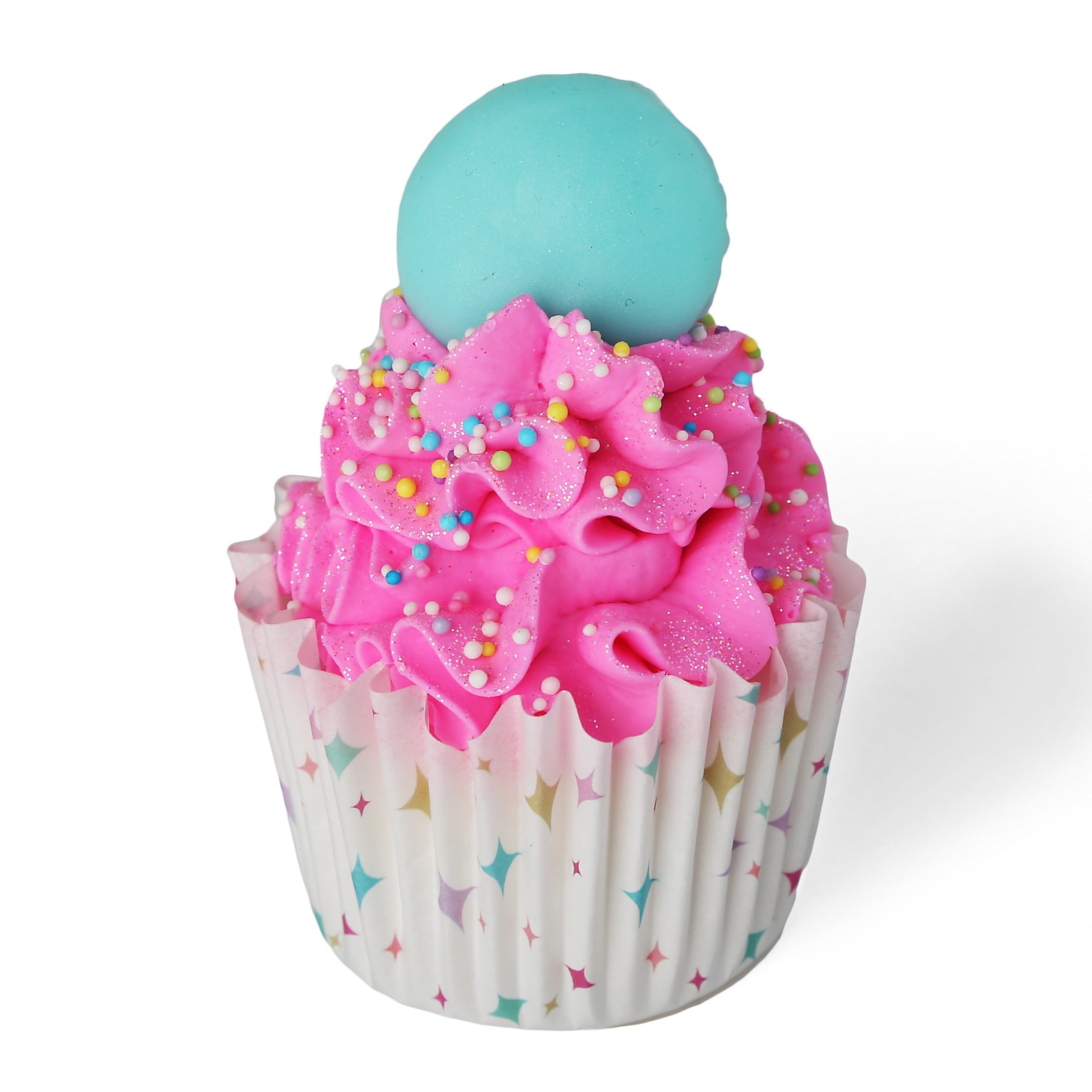 Day Dreamer Cupcake Soap. White liner with colorful pattern. Hot pink frosted soap topped with glitter and pastel sprinkles. Has a light blue macaron cookie on top.