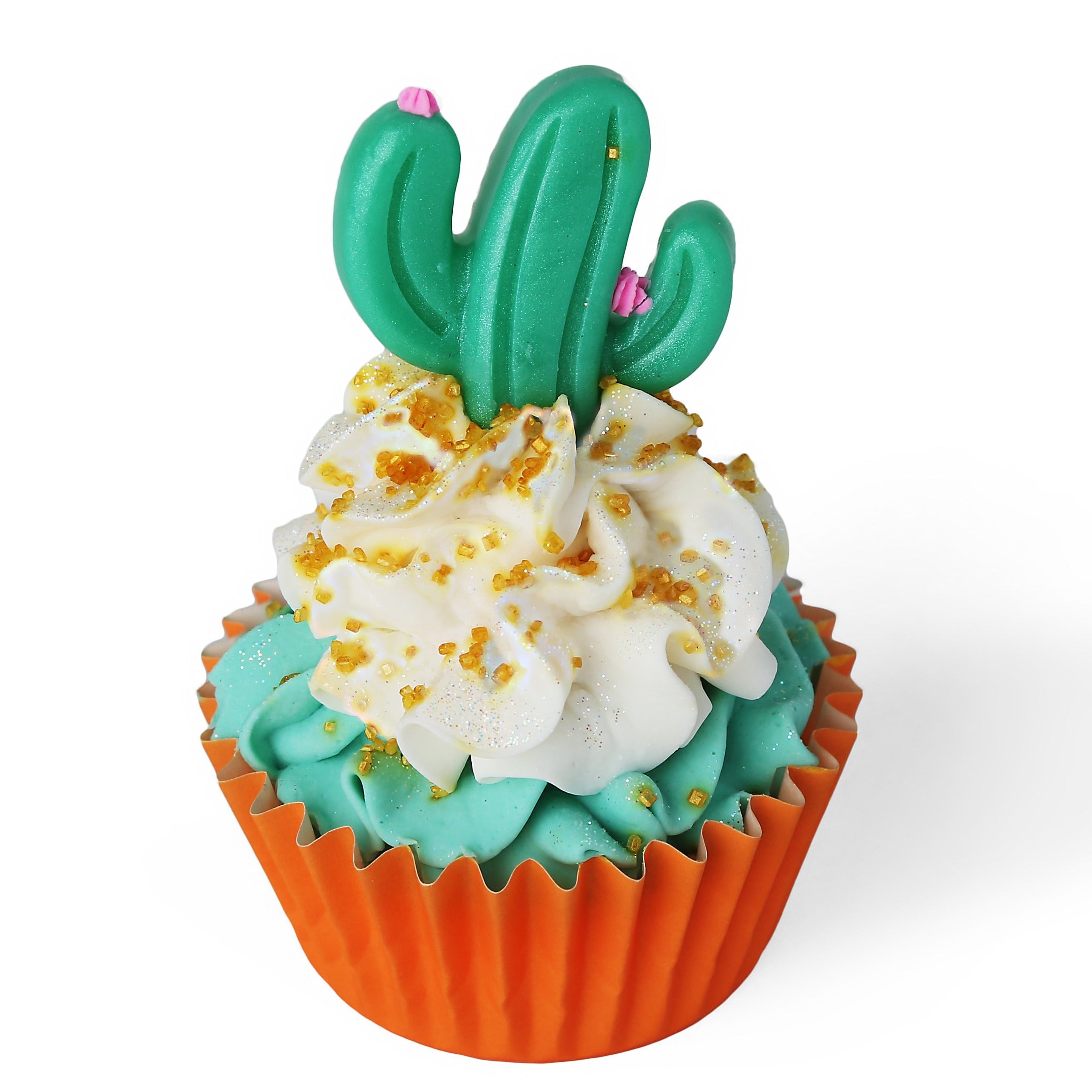 Cactus themed soap cupcake. Burnt orange liner with teal soap frosting with white soap frosting on top with gold glitter. Adorned with a green shaped cactus with tiny pink flowers